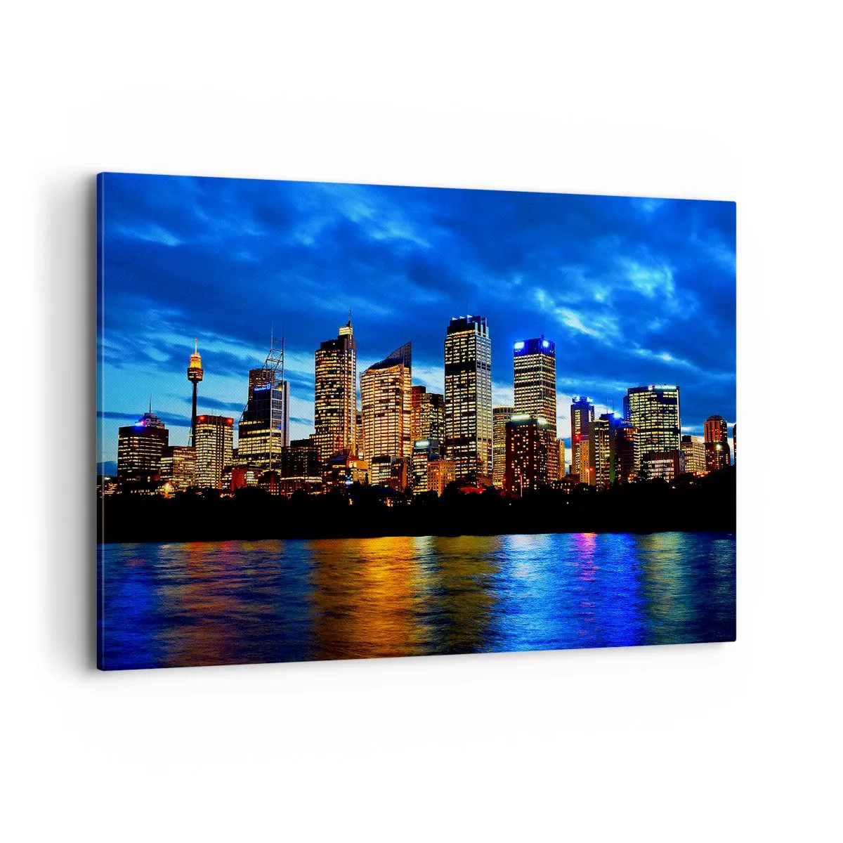 Obraz na płótnie - Panorama nocnego miasta z podświetlonymi wieżowcami nad wodą - 120x80cm - Noc świateł i barw - Nowoczesna dekoracja ścienna do salonu, kuchni i sypialni ARTTOR