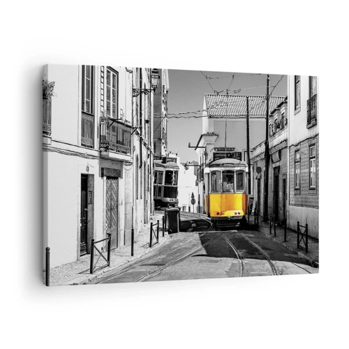 Obraz na płótnie - Duch Lizbony - Żółty tramwaj na ulicach Lizbony w monochromatycznej scenerii - 70x50cm