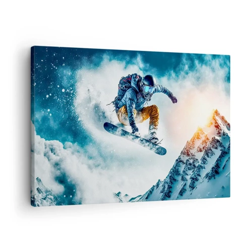 Obraz na płótnie - Ekstremalne emocje - Snowboardzista w locie nad ośnieżonymi górami - 70x50cm