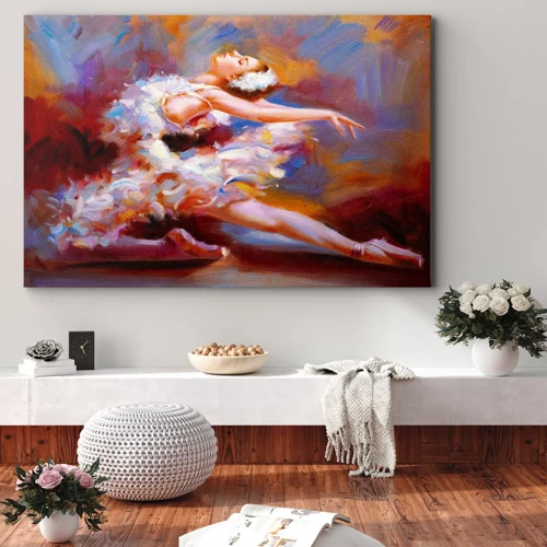 Obraz na płótnie - Łabędzia gracja - Balerina w dynamicznej pozie wśród pastelowych barw - 70x50cm