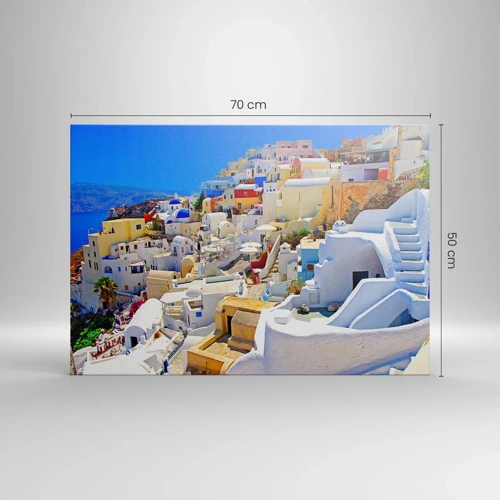 Obraz na płótnie - Marzenie o greckim lecie - Panorama Santorini z białymi domami i błękitnym niebem - 70x50cm