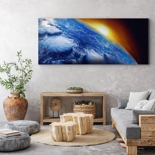 Obraz na płótnie - Wschód słońca nad błękitną planetą - 100x40 cm