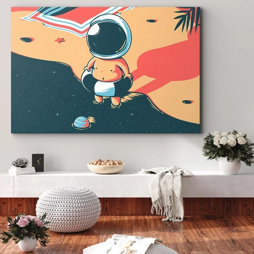 Obraz na płótnie - Z innej perspektywy - Zabawny astronauta na plaży z kosmicznymi elementami w tle - 70x50cm