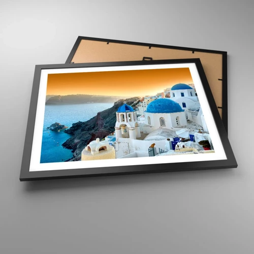 Plakat w czarnej ramie - Santorini - przytulone do skał - 50x40 cm